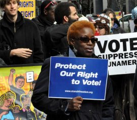 Occupy Wall Street joined the NAACP as thousands marched in midtown Manhattan on December 10, 2011 to defend voting rights.